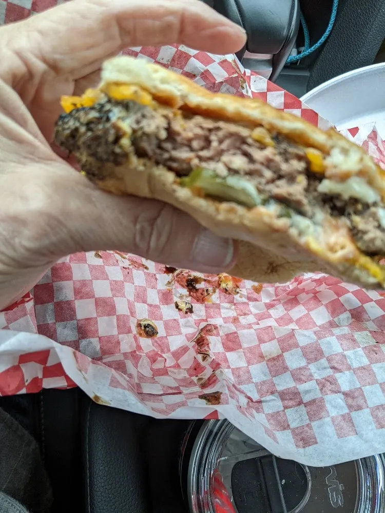 Cheeseburger with Mustard Ketsup Mayo and Pickles